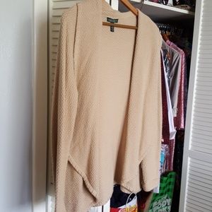 Ralph Lauren brand tan sweater.